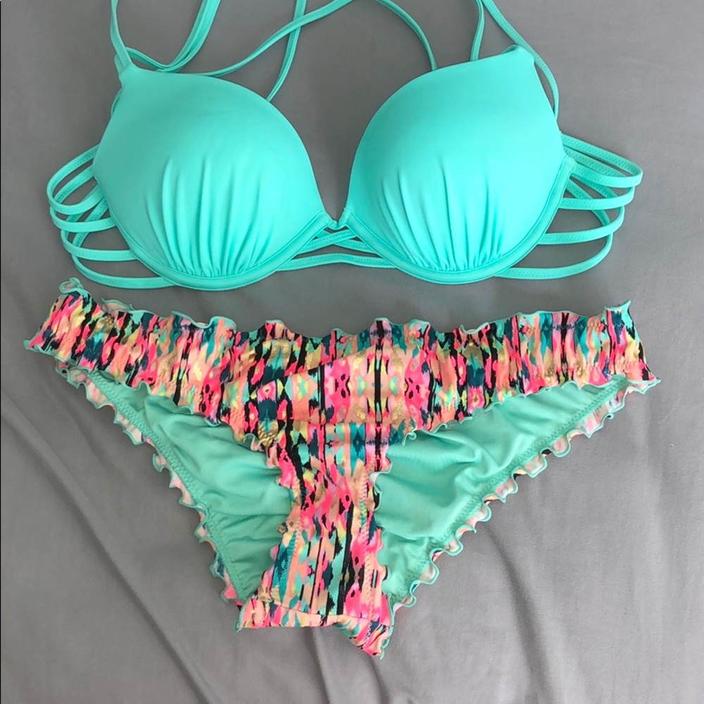 Teal crisscross back bikini with rainbow bottoms